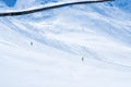 Skier skiing with helmet alone on the ski slope towards Matterhorn mountain on a beautiful sunny day in Switzerland Royalty Free Stock Photo