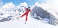 Skier skiing on a sunny day in high mountains. Ski downhill skiing in mountains. Rapid descent at high speed. Downhill Royalty Free Stock Photo