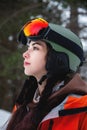 Skier, skiing, winter sports, female skier portrait. A beautiful girl stands against the backdrop of snow-capped Royalty Free Stock Photo