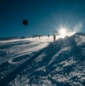 Skier slides down on the snow slope