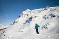 A skier on slope in alpine ski resort Royalty Free Stock Photo