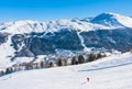 Skier on the slope of Ski resort Livigno Royalty Free Stock Photo