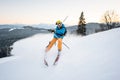 Skier in snow powder produces braking on slope of mountain Royalty Free Stock Photo