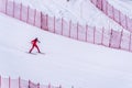 Skier trying to slow down at the bottom of the steep slope at Velocity Challenge and FIS Speed Ski World Cup Race at Sun Peaks Royalty Free Stock Photo