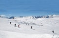 Skiers on Alpine ski slope