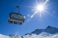 Skiers in a chairlift Royalty Free Stock Photo