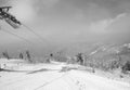 Skiers on chairlift - Black and White Royalty Free Stock Photo