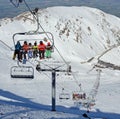 Skiers on the Chairlift Top of Mount Hutt Ski Field Royalty Free Stock Photo