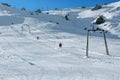 The skiers climb up the hill with a T-Bar chairlift in the Saklikent Ski Center of Antalya.