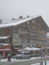 Skiers come back to town in a snowstorm