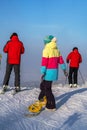 Skiers are down the hill, winter day, Moscow region, Russia Royalty Free Stock Photo