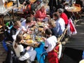 Skiers enjoy lunch outdoors