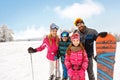 Skiers family together on skiing Royalty Free Stock Photo