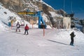 Skiers leaving a Chairlift in Cortina d` Ampezzo Royalty Free Stock Photo