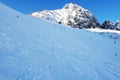 Skiers on mountain slope in winter sunny day in High Tatras. Royalty Free Stock Photo