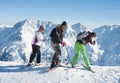 Skiers mountains in the background