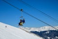 Skiers riding chair lift at Breckenridge Ski Resort