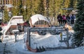 Skiers sitting on ski lift chair in resort Jasna, Slovakia