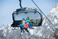 Skiers on a ski lift. Royalty Free Stock Photo