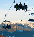 Skiers ski lift mountains resort Royalty Free Stock Photo