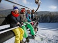 Skiers in ski lift over ski terrain Royalty Free Stock Photo