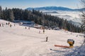 Skiers on ski slope on Kubinska Hola ski restort during winter