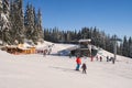 Skiers on ski slope on Kubinska Hola ski restort during winter