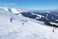 Skiers on a slope in Jasna Low Tatras