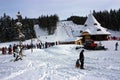 Skiers on the slope, Romania