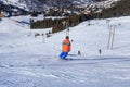 Skiers on the slopes of the ski resort of Meribel Royalty Free Stock Photo