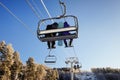 Skiers and snouborders on snow slope in winter ski resort. Ski elevator on snow mountain. Winter activity concept. Cable car ski Royalty Free Stock Photo