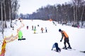 Skiers on a snow slide. Winter fun
