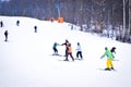 Skiers on a snow slide. Winter fun