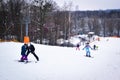 Skiers on a snow slide. Winter fun