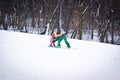 Skiers on a snow slide. Winter fun