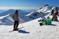 Skiers and snowboarders before descend on the ski track Royalty Free Stock Photo