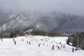 Skiers and snowboarders enjoying good snow Royalty Free Stock Photo