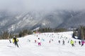 Skiers and snowboarders enjoying good snow Royalty Free Stock Photo