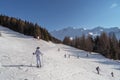 Skiers and snowboarders in mountains ski slopes of resort Les Arcs, France. Royalty Free Stock Photo