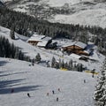 Skiers and snowboarders riding down the slope at the Vail Ski Resort, Colorado. Royalty Free Stock Photo