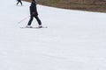 Skiers and snowboarders riding on a ski slope Royalty Free Stock Photo