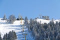 Skiers and snowboarders on a ski lift Royalty Free Stock Photo