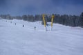 Skiers and snowboarders on a ski lift Royalty Free Stock Photo