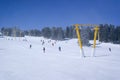 Skiers and snowboarders on a ski lift Royalty Free Stock Photo