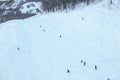 Skiers and snowboarders on the track snow ski resort Royalty Free Stock Photo