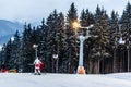 Skiers on the track