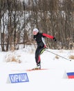 Skiers on the track.