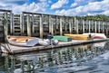 Skiffs and dinghy on a floating dock Royalty Free Stock Photo