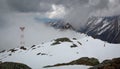 Skiing above the clouds Royalty Free Stock Photo