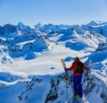 Skiing with amazing view of swiss famous mountains in beautiful winter snow Mt Fort. The matterhorn and the Dent d`Herens. In th Royalty Free Stock Photo